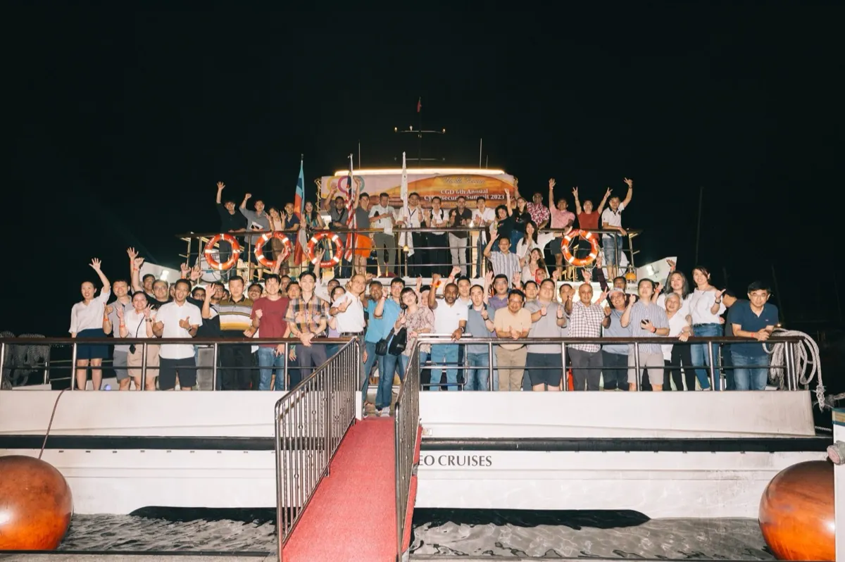 Delegates celebrating on the deck during the networking cruise